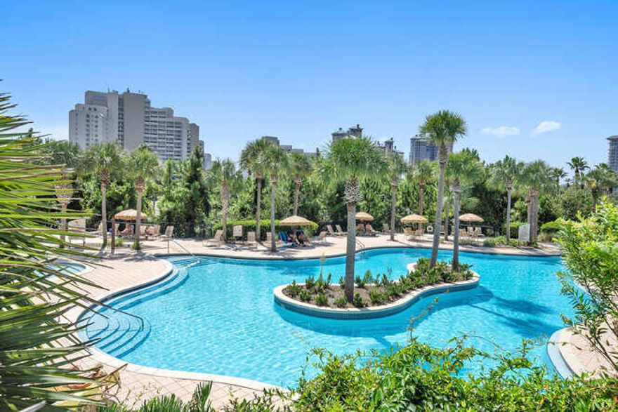 A-RATED, West-facing 1BR offers this area's spectacular SUNSETS daily! Large balcony fully furnished and rental ready. Hot water heater, air conditioner, carpet and nicely furnished & accessorized. LUAU features security gates, covered parking, a roof top observation area, large heated pool with a swim-under waterfall and a heated spa. The entry fountain, BBQ area and swimming pools are located along a stream that winds through the complex's lush landscaping. There is a fitness center in the complex, helping to make Luau a self-contained oasis.