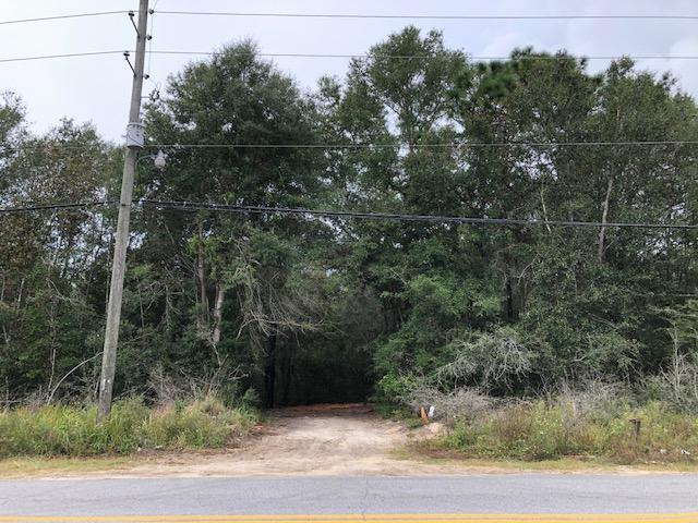 Over a half acre lot, partly cleared. Build your dream home! 2019 Survey in documents.Water, electric and phone service available.Buyer to verify all measurements and pertinent information.