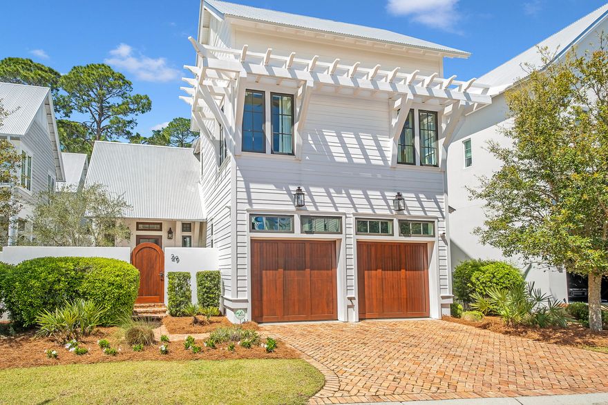 Tucked away in Churchill Oaks, this exquisitely designed Geoff Chick Coastal Home has 4 Bedrooms and 4.5 Baths.  High end finishes throughout the house including New White Oak Hardwood  Flooring and Coffered Ceilings.  The Architectural Details blend functionality and understated elegance. Decorated by Summer House. The Furniture and Artwork are Negotiable. This Custom Home features Master Suites on the First and Second Floors and an Open Living Area on both levels.