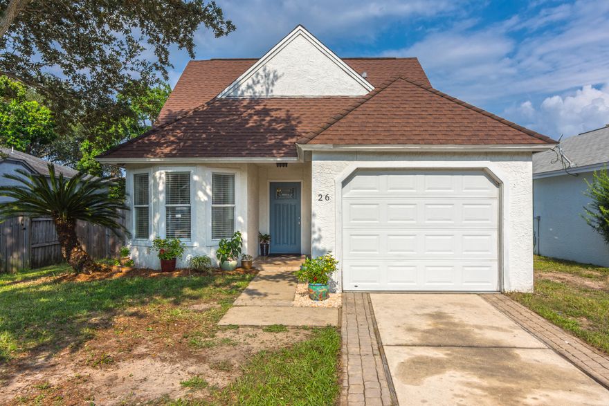 Charming 3 bedroom 2 bathroom home with upstairs bonus room, located in the heart of Destin. Freshly painted throughout, home features vaulted ceilings in the open dining and living space, an updated kitchen with stainless steel appliances, tile back splash, breakfast nook and pantry, and a first floor master bedroom with easy access to back patio, two closets and an ensuite bathroom. Upstairs are two bedrooms, each with access to large deck overlooking the back yard and a full bathroom. Also located upstairs is a bonus room, which would be perfect for an office or playroom. Home has a BRAND NEW American Standard Air Conditioning unit to keep you cool all summer long. Make this Florida Cottage yours today!