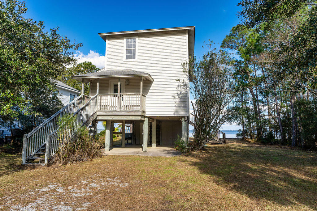 Amazing view of the Bay await, from the Auction REO Florida Cottage styled home. This home has 2 bedroom and 2 baths. Beds and baths are located on the 2nd floor. Kitchen and the living room both have beautiful view of the Bay. To help visualize this home's floorplan and to highlight its potential, virtual furnishings may have been added to photos found in this listing.