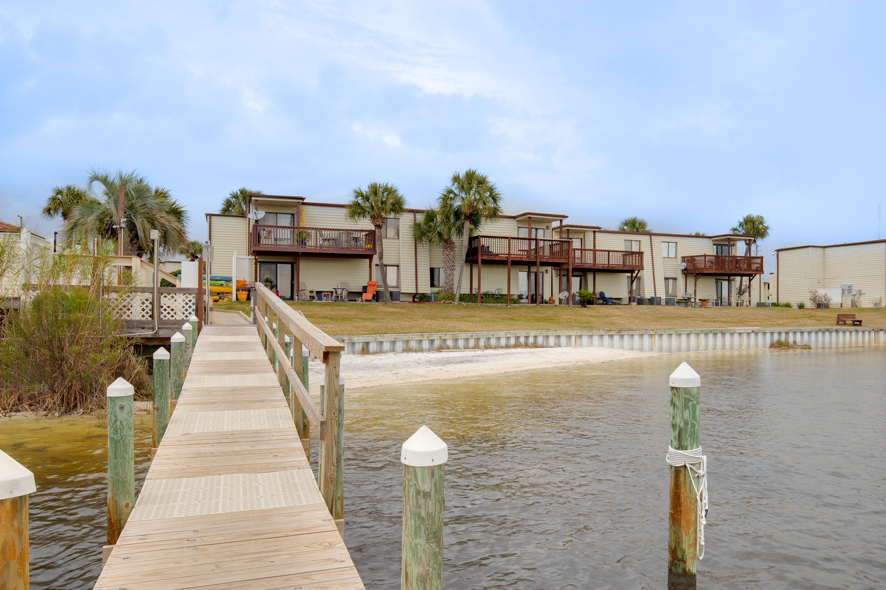 Updated one bedroom one bath second floor condo with spacious balcony overlooking the Santa Rosa Sound. Open living area features ceramic tile updated kitchen cabinets and stainless appliances. Washer/dryer hookups in unit. Bathroom features stand up custom tile shower. Take advantage of Fountainhead condo amenities including a spacious sound front in ground pool, as well as grilling and picnic areas.
