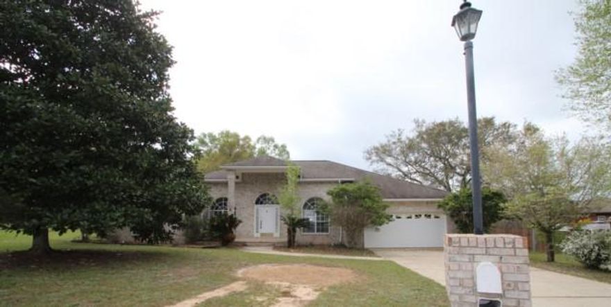 REO SOUTH OF I-10! Cut minutes and miles off your commute when you live in this brick contemporary in Page Place. Be able to enjoy more time at home with your family instead of in your car! This FOUR BEDROOM THREE FULL BATH home looks much younger than its age because its design was years ahead of its time! This very popular, easy-living open floor plan features a 3-way split so all the bedrooms offer lots of privacy! Entering into the tiled foyer, you'll notice the 10' ceilings throughout the center of the house. large The large arched windows and the transoms allow natural light to brighten the home throughout the day. The formal living and dining rooms flank the foyer which then leads into a spacious great room with a fireplace. Screened porch. Two car garage.