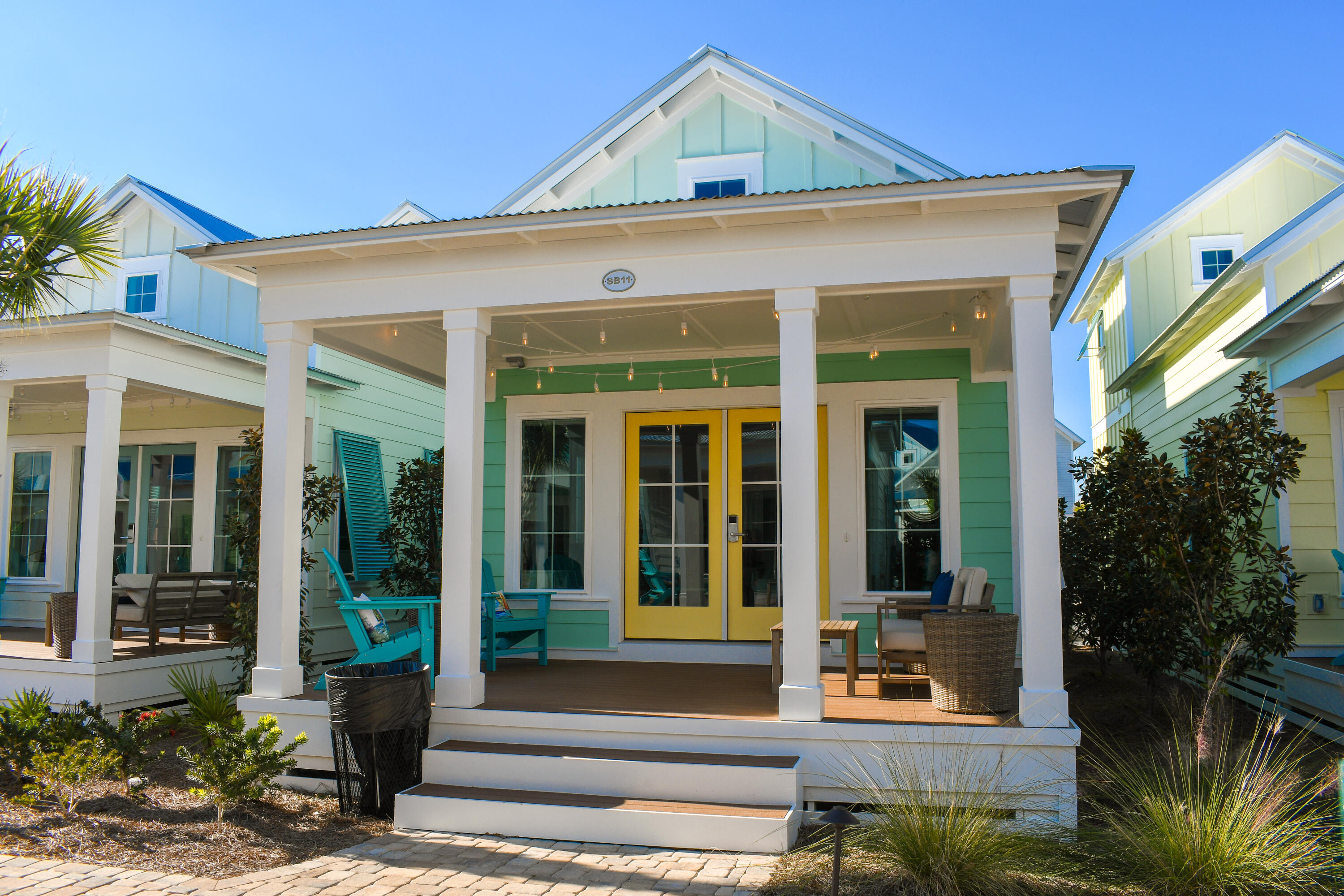 Be among the first to discover this thoughtfully curated and efficiently designed home in a charming ''surf village'' at Margaritaville Beach Cottage Resort in Panama City Beach. The Longboard plan lets you connect and gather on your front porch or step inside to explore 760 sf of heated/cooled space perfectly designed to fit your every need. These charming tiny homes feature a bedroom with a king bed and bath on the first floor and a sleeping loft with built-in full over full bunk beds on the 2nd level.