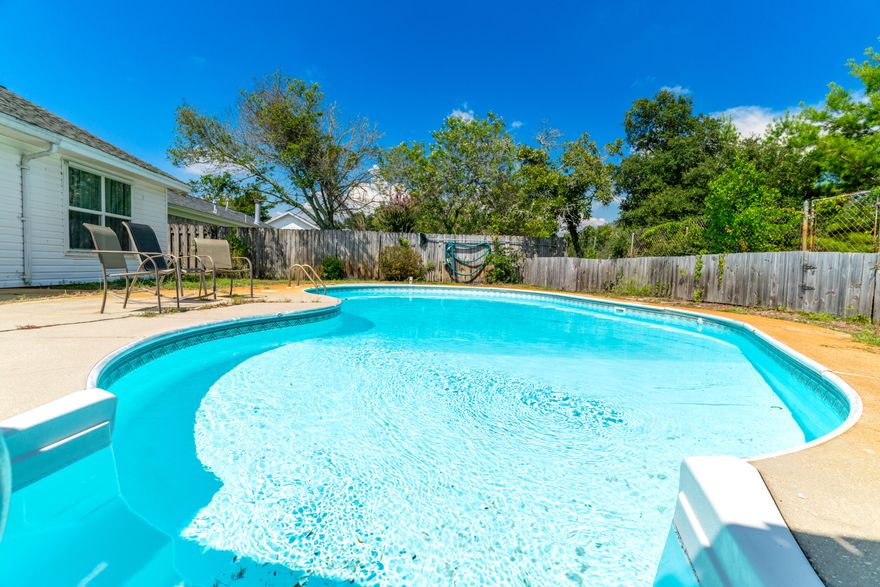 Only 5 Miles to Hurlburt Field and 17 miles to Eglin! New AC! Start or finish your days with a dip in the pool! Enjoy your 1st cup of coffee under your pavilion or in your screened in front porch. And as the sun sets, gather around your custom firepit for cozy evenings of marshmallow roasting and relaxation. Let the chef in you enjoy the natural gas stove. Let your imagination turn the large bonus room into something  special!