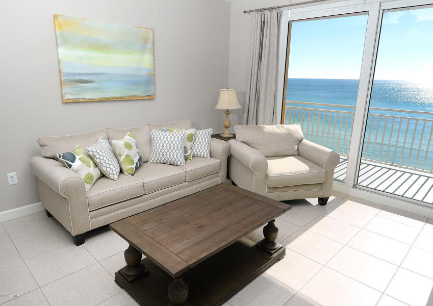 The best of the beach at Splash, located on the West end of the gorgeous beaches of Panama City. This professionally decorated, freshly painted, Wave floor plan is in pristine condition and has been upgraded with new wood-look tile floor and new furnishings throughout. The condo features a gulf front master bedroom with balcony access and an open concept living/kitchen with balcony access as well. This unit is a POWERHOUSE RENTAL!! This prime 4th floor location is the ideal elevation in the stack - no waiting for elevators means more convenience and greater demand from a renters! This stunning property is finished with 9 foot ceilings and granite counters in the kitchen and bathrooms!