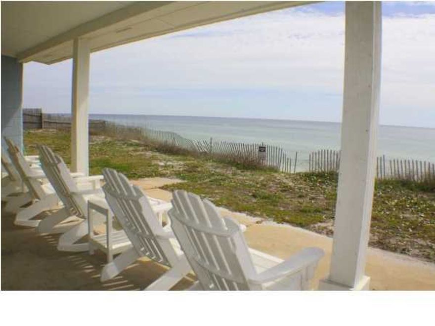 NEW PRICE... PRICED TO SELL QUICKLY!!! GULF FRONT IN BLUE MOUNTAIN... BEACH HOME RECENTLY REMODELED AND UPDATED!!! HIGHLY DESIRABLE AREA IN BLUE MOUNTAIN!!!This home sits on an elevated 100 foot wide lot on the Gulf of Mexico. 100 FOOT WIDE GULF FRONT LOTS ARE VERY RARE TO FIND!!! A new roof and windows were installed in November 2004 as well as a new sea wall was installed in 2008. This home has a covered front porch and a wonderful back porch to enjoy the spectacular views of the sugar white beach and The Gulf of Mexico. This is a family vacation home for the owner so home is an easy show. This gulf front home has GREAT RENTAL INCOME POTENTIAL!!! All dimension to be verified by seller.
