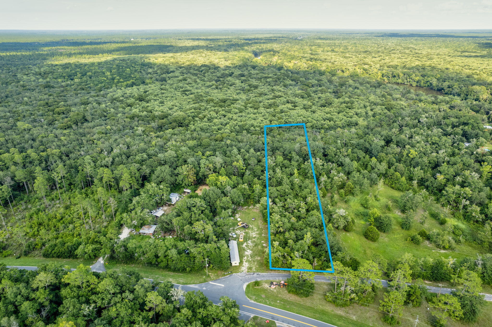 This two acre parcel on BMW Rd can be yours! So can the adjacent two acres north of this parcel. Make your dream a reality as you create your own oasis with this private lot. Whether you are cultivating fruits & vegetables in your garden or have you very own farm with animals. The possibilities awaits.
