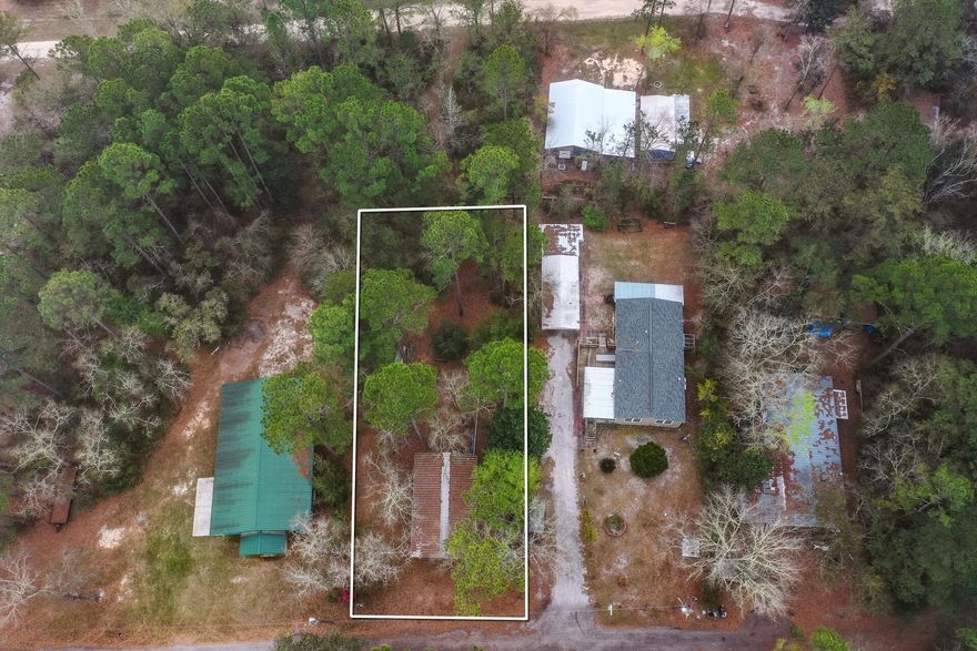 Great size lot with plenty of opportunity. Peaceful, tranquil and secluded best describes this property. 480 SqFt turnkey Park Model Home included with the lot. Full electricity and well already hooked up. Move in ready.