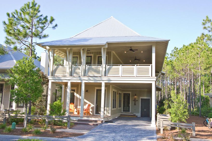 This beautifully appointed Watercolor home is a must see, built by Borges Brooks Builders in 2011 this home has been well loved and maintained by its original owners and never rented. The lot offers a natural buffer in front of the home and a wooded area behind it offering a beautiful setting for the huge outdoor entertainment area complete with outdoor fireplace. The first floor includes a gourmet kitchen with large walk in pantry, laundry room, office, powder room and one of two master suites. Upstairs includes three other large bedrooms one is a second master suite, a huge outdoor deck and entertainment area, with over 1700 sq ft. of porches total. This home is offered with a $175,000 Beau interiors furniture package, art and some items excluded.