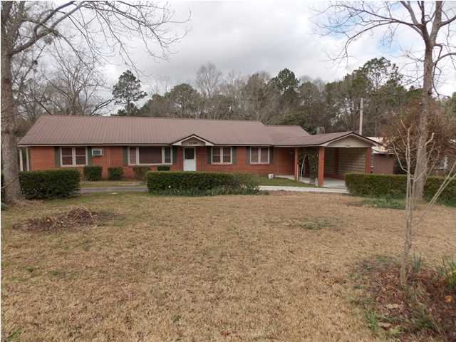 LOCATION***LOCATION***LOCATION*** An older home located in a very desirable area of DeFuniak Springs that has the potential to be your dream home. This home is within 5 minutes of WalMart, downtown, beautiful Lake DeFuniak, schools, anything that you would need. The home has been well maintained by the current owner and has good ''bones''. A very large yard that would be perfect for children and room in this home to handle the entertainment needs of a growing family. The potential is here and with a little TLC and planning this could be the perfect match for you. The South end of the home was built as an apartment complete with a separate kitchen and bath. If you are past the point in life that you need room for kids, but you may need room for aging parents this would be perfect! Take