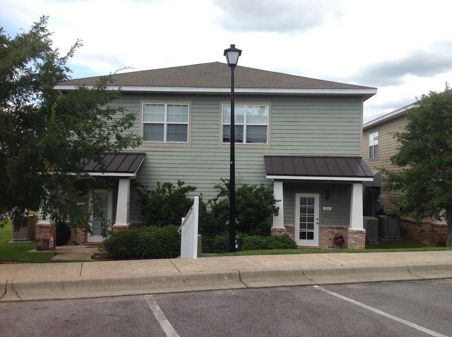 Beautiful unfurnished 2BR/2.5BA townhome in Crestview! Arbor Lake is quietly tucked away from the hustle and bustle of traffic, yet centrally located to the downtown center, restaurants, schools and shopping. Downstairs you will find plank flooring and carpet as well as a spacious half bath that includes a laundry area behind bi-fold doors. The kitchen offers top of the line stainless steel appliances with granite countertops, a large breakfast bar, and plenty of storage in your cherry wood cabinets. The pantry also holds custom made shelving.
French doors are located in the living room and lead to a patio for your cookout gear. Upstairs you will find two bedrooms, each equipped with their own private bathrooms as well as walk-in closets. An additional linen closet is located in the hall for extra storage. A nature walk follows down to a pond on-site and a beautiful community pool with grill, great for BBQ's. Pets allowed with approval and deposits.