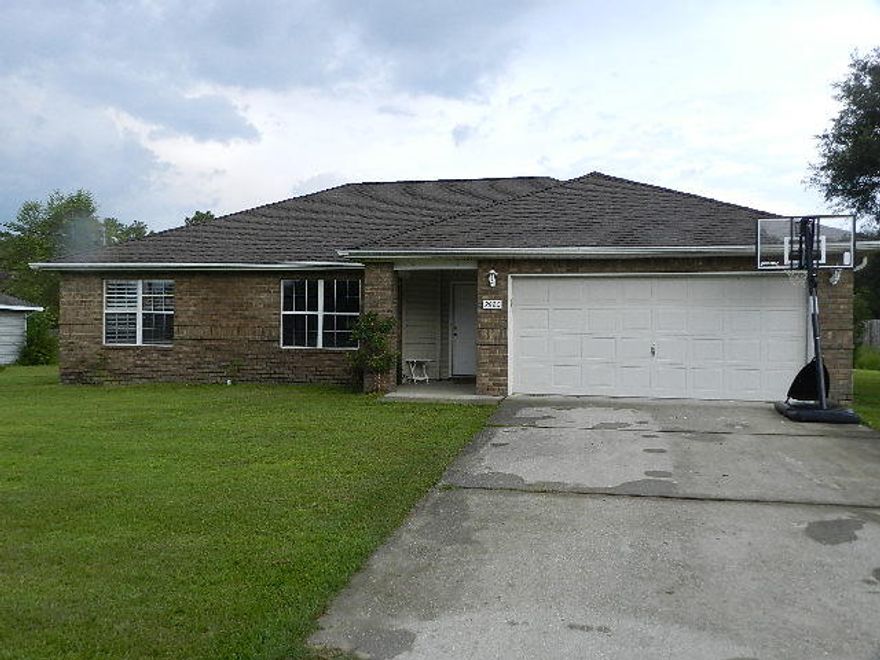 VA Compromise Sale - 2007 Contemporary 3 bdrm, 2 bth home with a split and open floor plan. Interior features: Great room has stressed wood laminate, raised ceilings, knock-down throughout (no popcorn), large master bedroom w/large walk-in closet and boxed ceiling; finished cabinets, stainless steel appliances, refrigerator does not convey, pass through to living room from kitchen. Large kitchen and dining area, large laundry area. Upgraded fixtures in both baths. Exterior has above ground pool, large climbing club house, fenced yard (coming), lawn pump, sprinkler system, and 30-year dimensional shingles. No HOA restrictions or fees. Close to schools, shopping, beaches and Hurlburt AFB. Want a three-bedroom home with great features, This Is It!