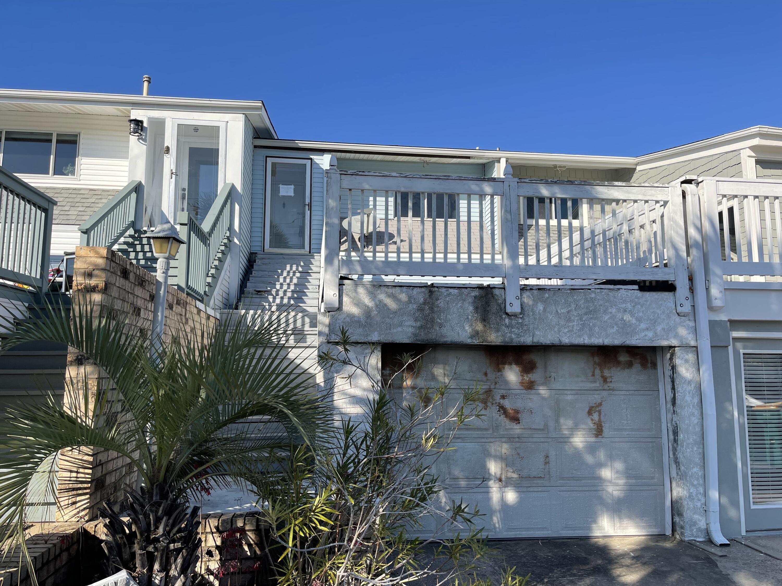 Roll up your sleeves and come see what this Harbor View waterfront REO home has to offer. Located on Holiday Isle and with amazing deep water views of Destin Harbor, this property is one to see. Home is just under 1700 sf and hand 2 bedrooms and 2 baths with a 1 car garage. Lots of potential! Call to set up your showing today!