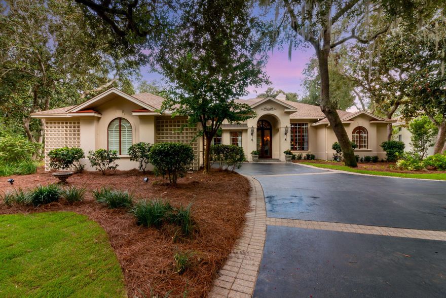 NEW ROOF, NEW Exterior Paint, NEW Water Heater. Conveniently located in the gated golf course community of Kelly Plantation, this stunning mediterranean style home is in an oasis style cul-de-sac with a wooded lot and featuring gardens and serene privacy. Close by is a nature walkway leading to the bay and a dock for those who love kayaking, paddle boarding, fishing or quietly sitting and enjoying beautiful sunsets. Custom architectural details of this home include grand mahogany entrance doors, classic columns, Italian marble floors, antique sconces, and stunning 14 foot ceiling heights throughout the main living area. The large heated pool is enclosed with a hot tub and offers wonderful views of the garden and mature trees. The kitchen features granite countertops, a gas stove, ice maker, and comfortable gathering area. The home also features a formal dining area, spacious living room, and a very nice study or home office with storage closet. The community of Kelly Plantation offers manned entrance gates, sidewalks, walking trails, fitness center, owner's clubhouse, Fred Couples designed golf course, golf clubhouse with pro shop and grill, playgrounds, tennis courts and pickle ball courts. There are many clubs and social activity's available for fun and networking. Immerse yourself in the best Destin offers in luxury living, neighborhood amenities, and convenient location, and visit this fine residence today!