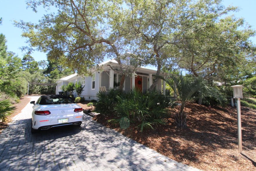 Location, Location, Location! This home is a short walk to the beach and on a windy day you can hear the waves. Three public beach accesses are just minutes away. The street is so peaceful. Home has an amazing family room. High ceilings with wood beams and custom build bookshelf. Hardwood floors throughout. All impact windows and medal roof. No HOA, perfect second home or primary residence.