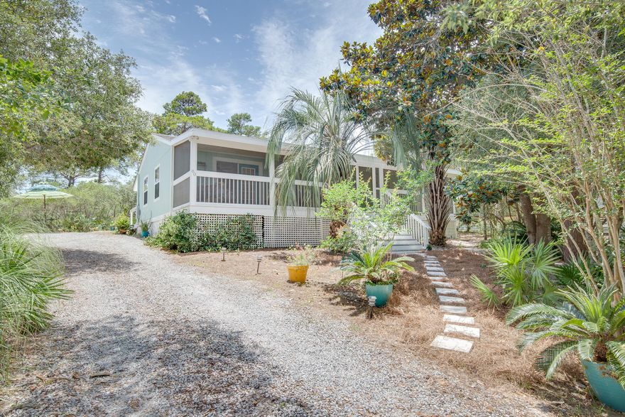 Are you are looking for an classic-style Florida cottage? Look no further, 80 Oak Hill Lane is the home for you! Located in Blue Mountain Beach nestled amongst a grove of oak trees, magnolias, and palmettos this large high and dry lot provides a private secluded tropical setting.  This charming 2BR/2BA residence features granite countertops in the kitchen, Bamboo and LVP flooring and an oversized spacious screened porch perfect for relaxing. New metal roof installed 6/3/21 New A/C installed 6/8/21. Short distance to public beach access, restaurants, shops, and the pedestrian path that runs along the entire length of the 30A corridor. There is no homeowner's association or dues.  The driveway is large enough to park plenty of vehicles.  An adorable quaint little gem that is a must see! This cottage makes an excellent primary, or second home get away.
 Under contract.  We will still allow showings and take back up offers.