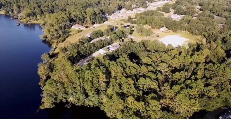 Look no further for that special place to build your beautiful home! Located south of I-10 where you'll find Meadow Lake. This lakefront parcel is just over 1 acre located on a cu-de-sac with over 100' on Clyde Reese Pond. Enjoy those well deserved therapeutic breaks gazing at the water after that long day at work. Don't let this opportunity pass you by.