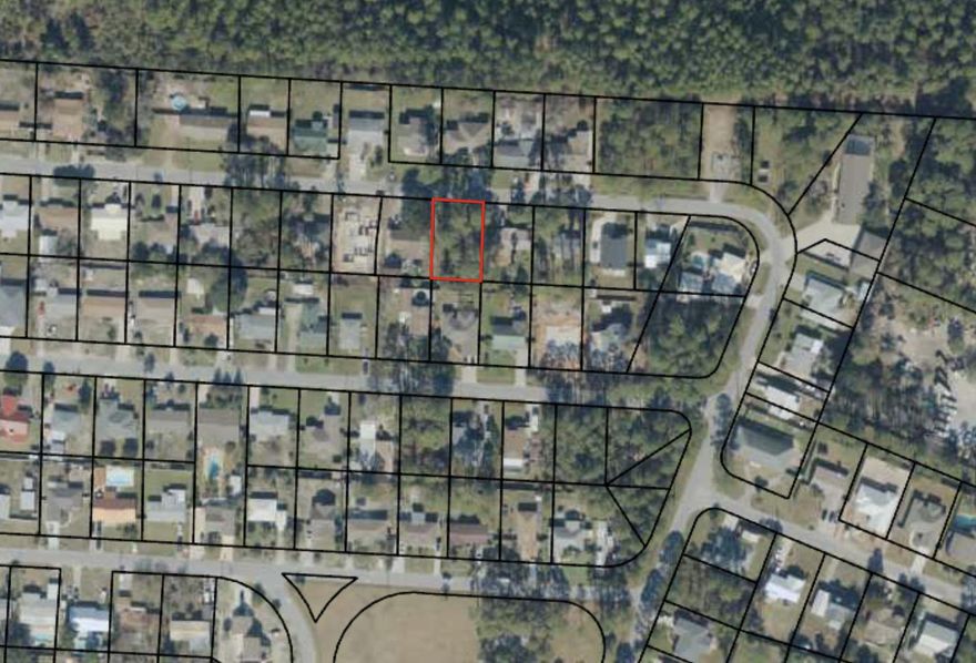 Located only two blocks from Scott Field Park with playground, open field, basketball court and picnic pavilion, this .2 acre wooded residential lot is ready to be cleared for you to build your home. Enjoy the beach, only 1 mile away. Less than a mile to Frank Brown Park, with fishing, swimming, baseball fields, playground, tennis and events. Pier Park is located less than 1.5 miles away, with dining, shopping, groceries.