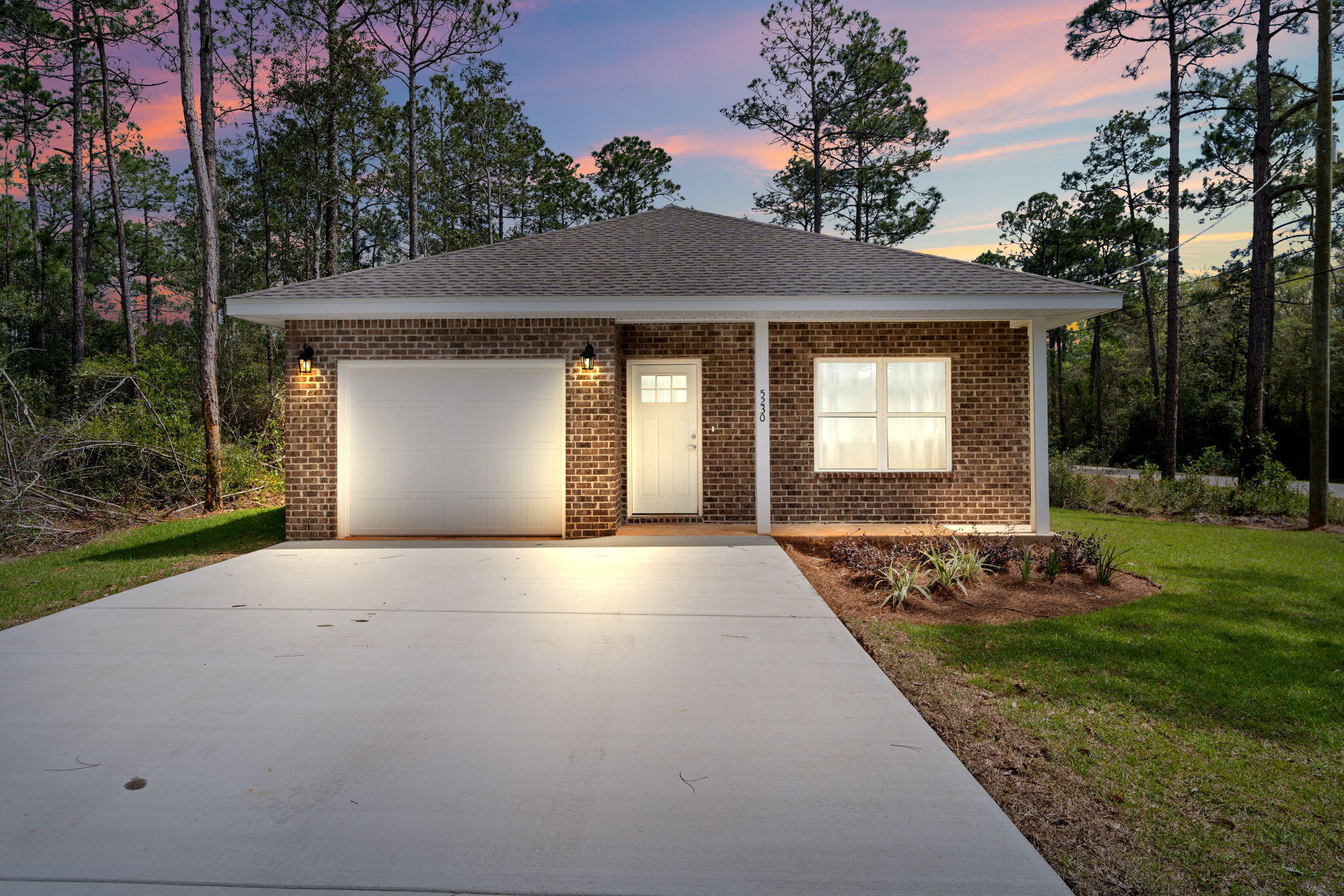 New Construction with exceptional quality! Brick Craftsman 3 bedroom, 2 bathroom home has luxury vinyl flooring throughout, ceiling fans & an open concept. The kitchen has granite countertops, stainless and black stove, and dishwasher, soft close cabinets, breakfast bar overlooking the living room with a trey ceiling. The primary bedroom also has a trey ceiling, Luxury vinyl flooring & a pocket door leading into the bathroom with walk in closet, double vanity, granite countertops, shower combo. Additional bedrooms with ample space & an additional full guest bathroom. The back door opens to a covered patio. The yard will have full sod. The extra wide driveway for ample parking. Seller will contribute $5,000 towards buyer's closing costs & interest rate buy-down with preferred Lender.