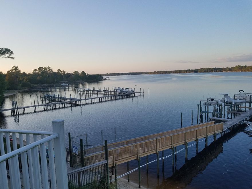 This beautiful lightly-lived in home features 2 bedrooms with option for office or bedroom on both the first and third floors. The first floor features Travertine tile and recessed lighting with ten foot ceilings. Upscale touches continue with beautiful wrought iron and wood staircases and railings. Nearly new kitchen appliances and granite counter tops also confirm the builder's emphasis on quality. The home features a spacious second floor master bedroom with balcony! A second bedroom with bathroom is also present on this floor as well as a laundry area with a like-new washer/dryer. A bonus room is available on the third floor, which can be used as an office, exercise room, or entertainment area with wet bar and room for refrigerator. https://sites.google.com/site/hiddenbayvillagephaseii