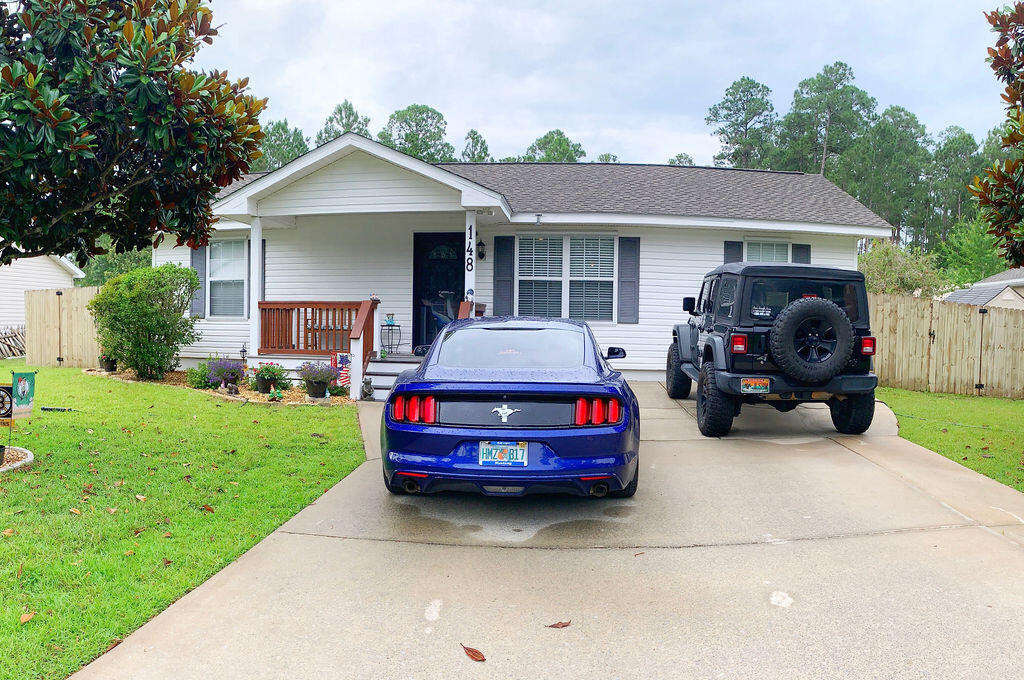 A short drive to the beach and bay, this cute Florida cottage is ideal for enjoying the Santa Rosa Beach lifestyle. Kitchen appliances are only 2-year-old and the washer and dryer, that stay with house, are 4 years old. Roof and A/C were replaced in 2017. As well as an installation of brand-new natural walnut floors. The Palmetto Plantation community has added benefits of a community pool, gazebo and playground.