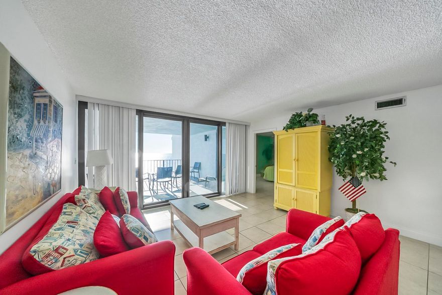 This spacious gulf front condo is almost 1400 square ft ! You will enjoy both sunset views from your living room and breathtaking views from the gulf front Master! Access your extra large balcony from both the Master and Livingroom. This spacious condo is currently a rental machine and being sold fully  furnished, set up to sleep 8! You will find a separate laundry area, well equipped kitchen with beautiful granite counter tops. The master bath offers an extra long vanity with double sinks!  Don't forget about the amenities such as  a large pool (seasonally heated), hot tub, kiddie pool, expansive sundecks, lighted tennis courts ,shuffle board court, indoor racquetball court, exercise room and access the to World's Most beautiful beaches!