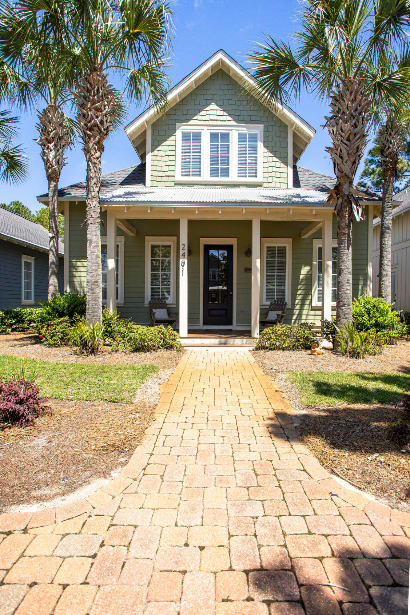 This captivating, luxurious home is one of the larger, most desirable floor plans in the Bungalos subdivision.  A tastefully appointed, impeccable, spacious, three bedrooms with a loft sleeping area and a bunk room is perfect for a second home or a rental investment or both.  Stainless steel appliances and granite countertops add to the ambiance.  The Bungalos community also has a pool in the center of the complex for the owner's enjoyment. The large driveway has parking for a golf cart as well.     The owners had the roof replaced in 2021.  Sellers cannot close prior to July 8, 2022