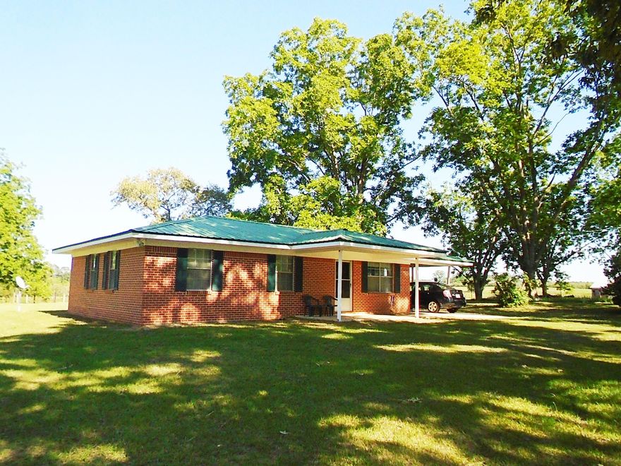 Located in North Walton County, this 40 acre farm offers an approximate 2 acre stocked pond, fenced pastures, barn and older Brick Ranch style home. This farm has been in the family for many years. Excellent soil for farming and gardening. There are approximately 19 pecan trees, 7 blueberry bushes and 2 fig trees. Farm is located on a paved road surrounded by other farms. Huge Barn (73' X 65') with a 23.6' x 29' concrete slab inside the barn. Some stalls in barn but could be easily be divided into additional stalls. Home is a traditional 70s Ranch with a 8x12 covered front porch. It's all here!! Not many farms like this become available. Don't miss this one!!