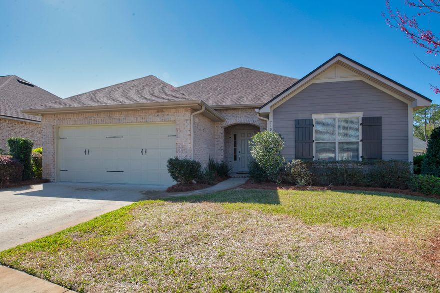 Like new home located in Magnolia Woods Subdivision.  This home features an open concept floor plan that contains three bedrooms and two and a half baths.  The spacious kitchen and dining area feature granite counter tops, stainless steel appliances and a large breakfast bar and a gas range. The home is complimented with many quality finishes like vinyl flooring, eight foot doorways, crown molding, surround sound speakers, sub woofers and receivers in the den area. The enclosed bonus room is equipped with HVAC can be used as a guest room, office or will make a great play room for the kids. The master suite includes double vanities, a full sized shower and a large walk-in closet. The back yard is equipped with a large brick patio, outdoor speakers as well as natural gas connections for your