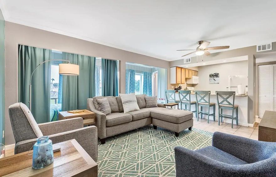 Rental Machine with Gross Revenue of $34,945.65 in 2022 and $30,909.08 in 2023.Rare Find 1 Bedroom 2 Baths, very spacious condo. Beautiful view of the Lake. Close to the pool & club house. Easy access. First floor walk out. Patio area closed in. Breakfast bar, tiled floors, granite counters, new appliances. many updates to this condo. Great rental for short or long term. Close to Beaches, Restaurants, Shopping & Entertainment. Amenities include: 3 Pools, Tennis, Out Door Grills, Community Room.