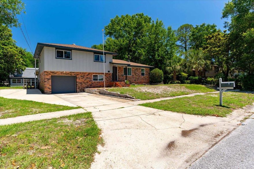 This split-level remodeled home greets you with an open floor concept - kitchen/dining and living areas and has laminate flooring. The upper level & bedroom areas have original refinished hardwood floors. Both bathroom showers feature spa shower heads, and the master bath includes a separate soaker tub. The guest bedroom boasts a Murphy bed that folds up to create extra space. Special features of this home include a whole-house central vacuum system, a Ranai tankless gas water heater, a Florida room with a wood-burning fireplace and an impressive outdoor back deck. Owner will allow cat only with a non-ref pet fee. All Coastal Realty Services residents are enrolled in the Resident Benefits Package (RBP) which includes renters insurance, HVAC air filter delivery (for applicable properties)