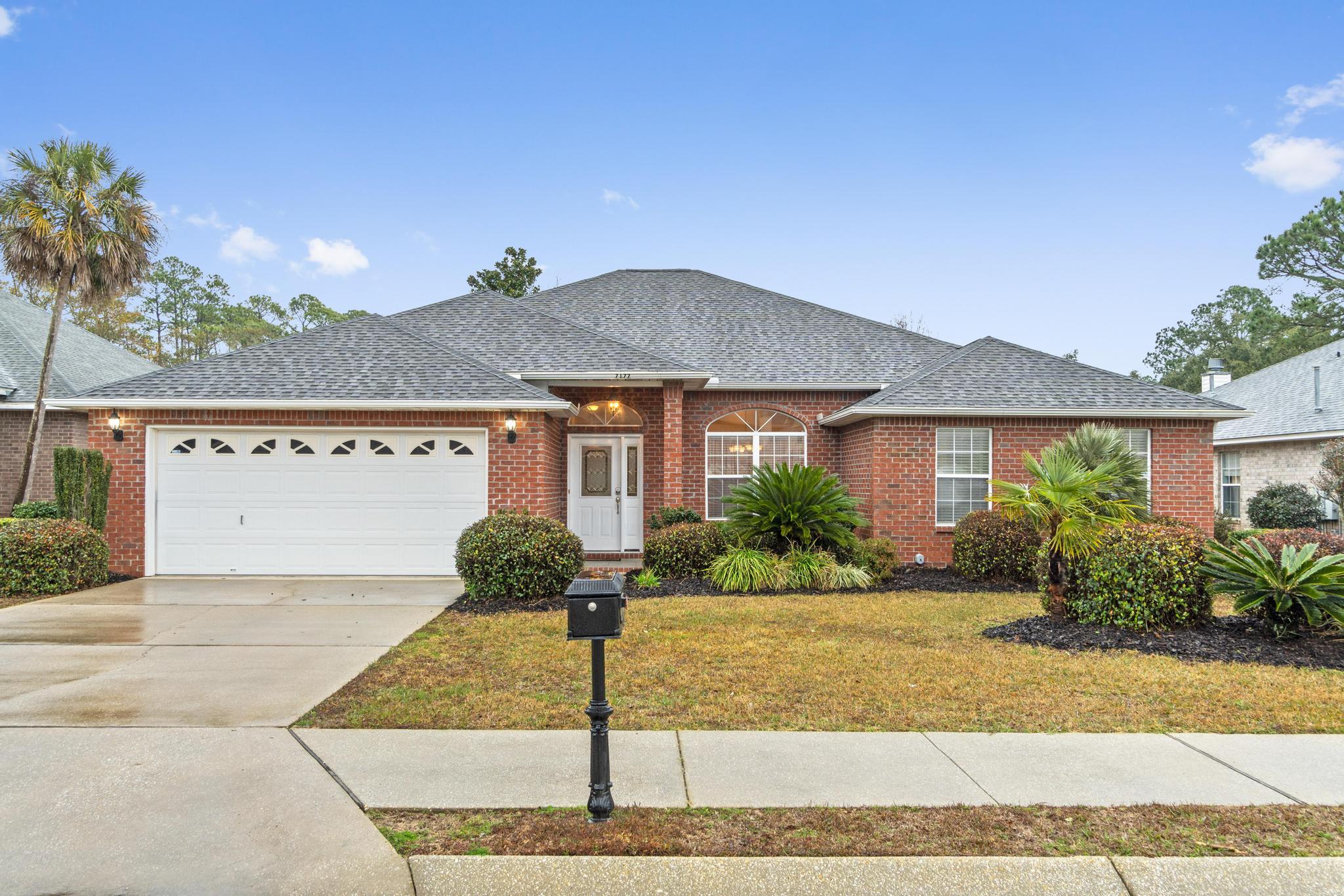 Let the sounds of the Sound welcome you home. This 3/2 brick beauty is nestled in the quaint Sound Hammock neighborhood, boasting community dock, pool and sidewalks so you can enjoy Florida living at its best. Offers a dedicated office space, in addition to the spacious 3 bedrooms. There is a screened in, tiled Lanai for outside entertaining without the bugs & fenced backyard. Evidence of a well maintained and cared for home is at every turn. A fresh, neutral color palate throughout allows you to personalize at leisure but enjoy immediately. Abundant, natural light floods this home, and at its center, the living room with hardwood floors and an impressive fireplace with a beautiful mantle and hearth. Solid wood cabinetry & stainless steel appliances make this very spacious kitchen... a cooks dream, warm and welcoming with ample storage and plant ledges, it's soon to become the very heart of this home.
The master bedroom has access into the backyard and an enviable amount of walk-in closet space, soak or shower in this very generously spaced master retreat. The additional bedrooms are equally comfortable and spacious.
If location is key, be sure to get the keys to this amazing, beautifully maintained, dream location home. It won't last long so come and enjoy Florida living in our beautiful town of Navarre.