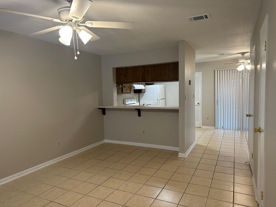 This beautifully maintained townhome offers a spacious and functional layout with plenty of natural light throughout. The large living area opens seamlessly into a tiled dining space and a well-appointed kitchen featuring a convenient breakfast bar ideal for both everyday living and entertaining. Both bedrooms are generously sized, and the unit includes washer and dryer hookups for your convenience. Owner will allow a small dog under 25 lbs. All Coastal Realty Services residents are enrolled in the Resident Benefits Package (RBP) which includes renters insurance, HVAC air filter delivery (for applicable properties) and our best-in-class resident rewards program, and much more! More details upon application.