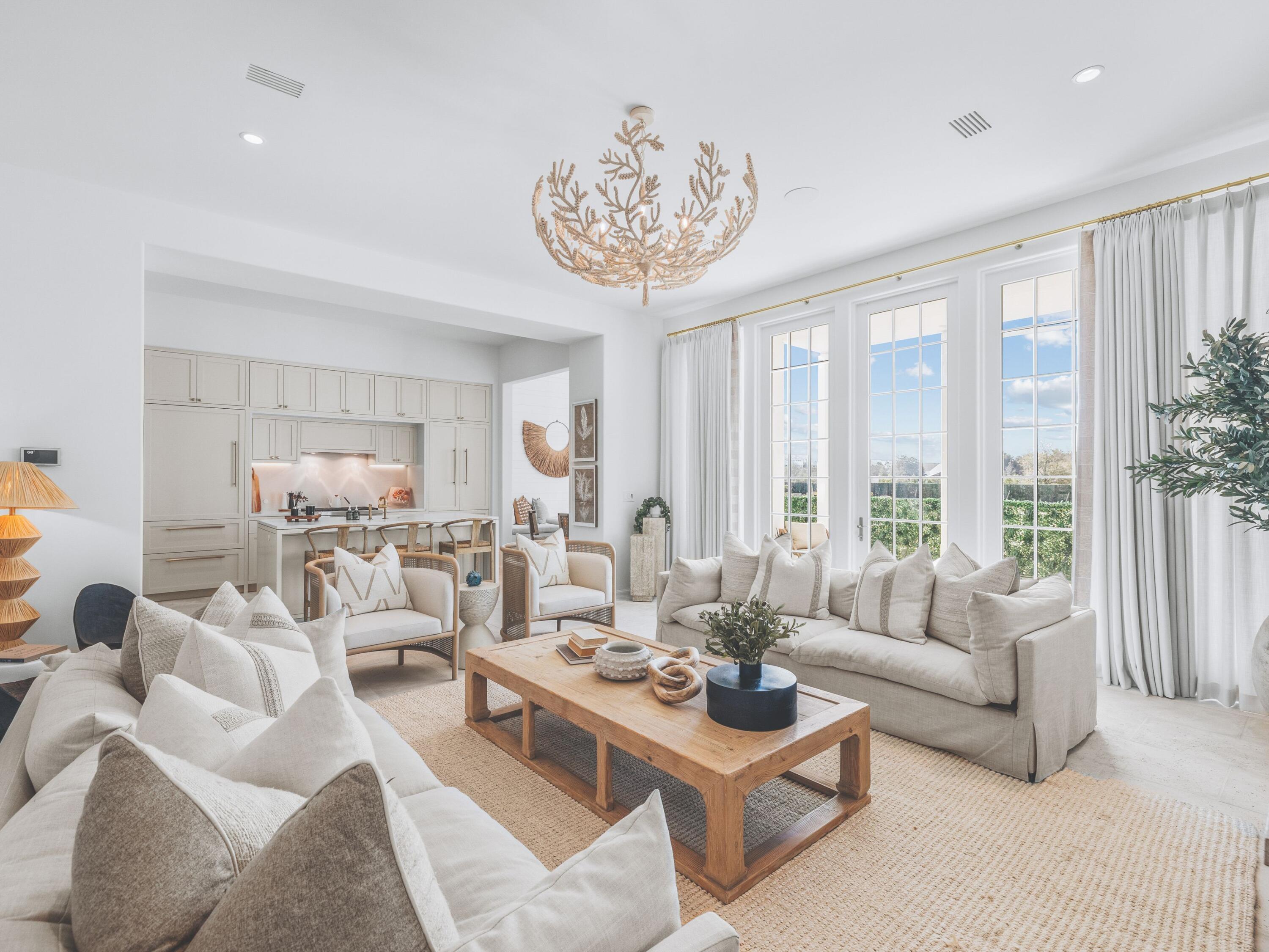 Step into an exquisite coastal sanctuary where timeless elegance meets modern sophistication. This masterfully designed Mews Cottage boasts over 2,700 square feet of impeccably crafted interiors, seamlessly blending with 895 square feet of covered outdoor living space--an effortless extension of luxury and comfort. A tropical hardwood entry porch welcomes you, leading into an open-concept living area where natural light dances across sleek surfaces. The living room flows effortlessly into the dining alcove and chef's kitchen, a culinary masterpiece featuring custom-painted wood cabinetry, Caesarstone countertops, a premium Subzero and Wolf appliance suite, and Waterworks fixtures.Large-format concrete pavers add a striking, contemporary touch, while a discreetly tucked-away pantry, powder room, and spacious two-car garage complete the main level.

Ascending to the second floor, the primary suite is a private retreat, complete with a serene balcony, a spa-like bath adorned with a marble-topped double vanity, and an expansive walk-in closet. Two additional guest suites, each with their own en-suite baths, provide refined comfort and privacyone of which is a stylish bunk room featuring two full beds and two twin beds, offering a perfect blend of functionality and charm for guests or family. A dedicated laundry room enhances convenience. Every detail of this home reflects superior craftsmanshipfrom the Marbletite steel-troweled stucco over concrete and masonry walls to the custom-stained cedar siding, railings, and shutters. Sierra Pacific hurricane-rated clad-wood French doors and windows invite the outdoors in, while a cedar shingle roof with copper gutters and leaders elevates the architectural charm. The second floor is finished with rich, pre-stained white oak planks, while the baths exude sophistication with custom-painted cabinetry and marble countertops.

Beyond the impeccable interiors, this residence offers a curated selection of premium enhancements, including bespoke white oak kitchen and bath cabinetry, a rejuvenating steam shower in the master suite, and a custom-designed midnight kitchen on the second floor. A state-of-the-art Control4 Home Automation System ensures effortless living at your fingertips.

Nestled in an exclusive coastal enclave, this home provides privileged access to a resort-style pool, spa, fitness center, and pavilion. Just moments from the powder-soft sands and mesmerizing emerald waters of the Gulf, this is more than a homeit's an experience. One of the final opportunities to own a coveted Mews Cottage, this stunning retreat awaits its discerning owner. Schedule your private showing today.