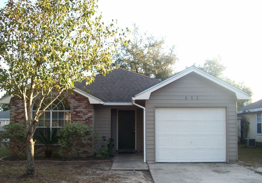 REDUCED!!!This 3 bedroom 2 bath home has new interior and exterior paint, new carpet in 3 bedrooms, tile floors, new light fixtures and hot water heater. Fenced yard, 1 car garage and fireplace. Home is being sold As IS but is in good condition with new roof after Ivan. All appliances are in working condition and are AS IS as well. Lawn pump and sprinkler system is AS IS and is not working.