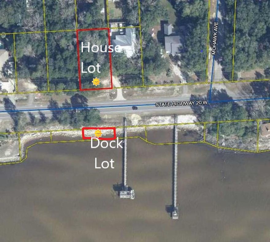 Prime Location  on Choctawhatchee Bay in Choctaw Beach. This lot is convenient to Niceville, the Mid Bay Bridge to Destin and  Freeport.  Build your House on the north side of Hwy 20 on the  80 x 150  lot and view the Bay from your front window/porch.  Then construct your dock which can be up to 1000 sq ft.  on the waterfront lot. (80 Ft. wide lot across the street)  Best of all, Flood Zone ''X'' ~
