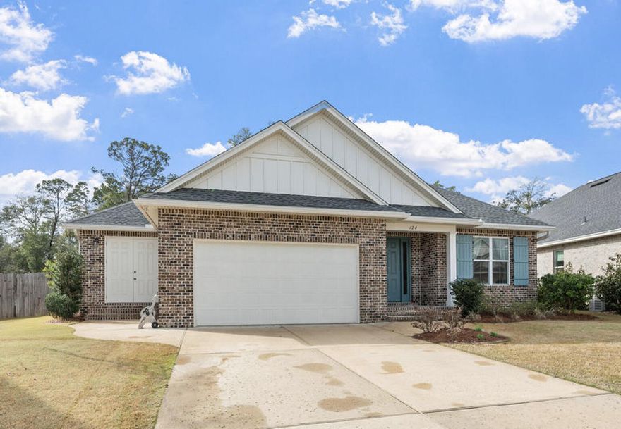 If privacy, upgrades, and maximizing space are at the top of your list, this 2021-built home delivers. Set on one of the largest lots in the neighborhood with no future homes behind it, this 4-bedroom, 2.5-bath property combines modern construction with thoughtful upgrades, flexible living spaces, and a backyard designed for both privacy and entertaining.Inside, the open-concept layout features 10-foot ceilings, 8-foot doorways, and durable luxury vinyl plank flooring throughout the main living areas. The kitchen is designed for both everyday living & entertaining, highlighted by quartz countertops, tiled backsplash, warm soft-close cabinetry with under-cabinet lighting, and Bosch stainless steel appliances with an exterior-vented range hood. The upgraded pantry includes custom shelving, electrical outlets, and additional lighting for added functionality.
The primary suite offers a spa-inspired bathroom with double vanities, quartz countertops, a frameless glass shower, and his & hers closets. All bathrooms feature tile flooring and premium finishes.

Additional interior features include ceiling fans in every bedroom, TV and ethernet drops in each room, surround sound wiring, and dedicated electrical circuits in the eaves for holiday lighting.
The flexible floor plan includes a flex space with pocket doors that can serve as an office, playroom, or additional living area. A separate bonus area with its own exterior entrance and two electrical zones offers excellent potential for a workshop, home gym, hobby space, or climate controlled additional storage.

Outside, the oversized backyard offers privacy and space to relax or entertain with a paver patio and privacy fencing. fencing. A small, screened porch provides a comfortable spot to enjoy the outdoors while staying protected from the elements. The property also includes a sprinkler system with lawn pump and well for irrigation, gutters, small storage shed, flood lights, and a welcoming front porch. Additional features for peace of mind include a termite bond, impact rated windows, and wireless ADT self-monitoring security system.

Conveniently located near military bases, schools, hospital, local amenities, and Northwest Florida State College, this home offers modern construction, thoughtful upgrades, and a highly desirable location.