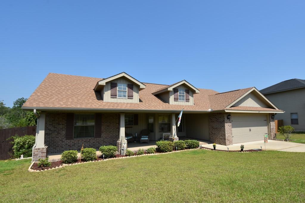 Pampered home that's better than new! South Crestview neighborhood convenient to shopping and the hospital. Seller helps w/closing costs: pays title insurance, 1-yr Old Republic warranty, stamps on deed and $1,200 toward your closing costs. This open split bedroom design has a spacious Foyer, Living, Dining, and Kitchen area w/cathedral over all. The Kitchen w/Breakfast Bar comes equipped with stainless steel appliances. Washer and dryer included. Enjoy the woodsy view behind your back yard from the Kitchen sink. Master Bedroom Suite has a tray ceiling, French Doors to the Bathroom, complete w/double vanity, separate shower, garden tub, walk-in closet. Shelving in the Laundry Room for Pantry. Large wood Deck overlooks the manicured lawn and privacy fenced back yard. Spr System front yard.