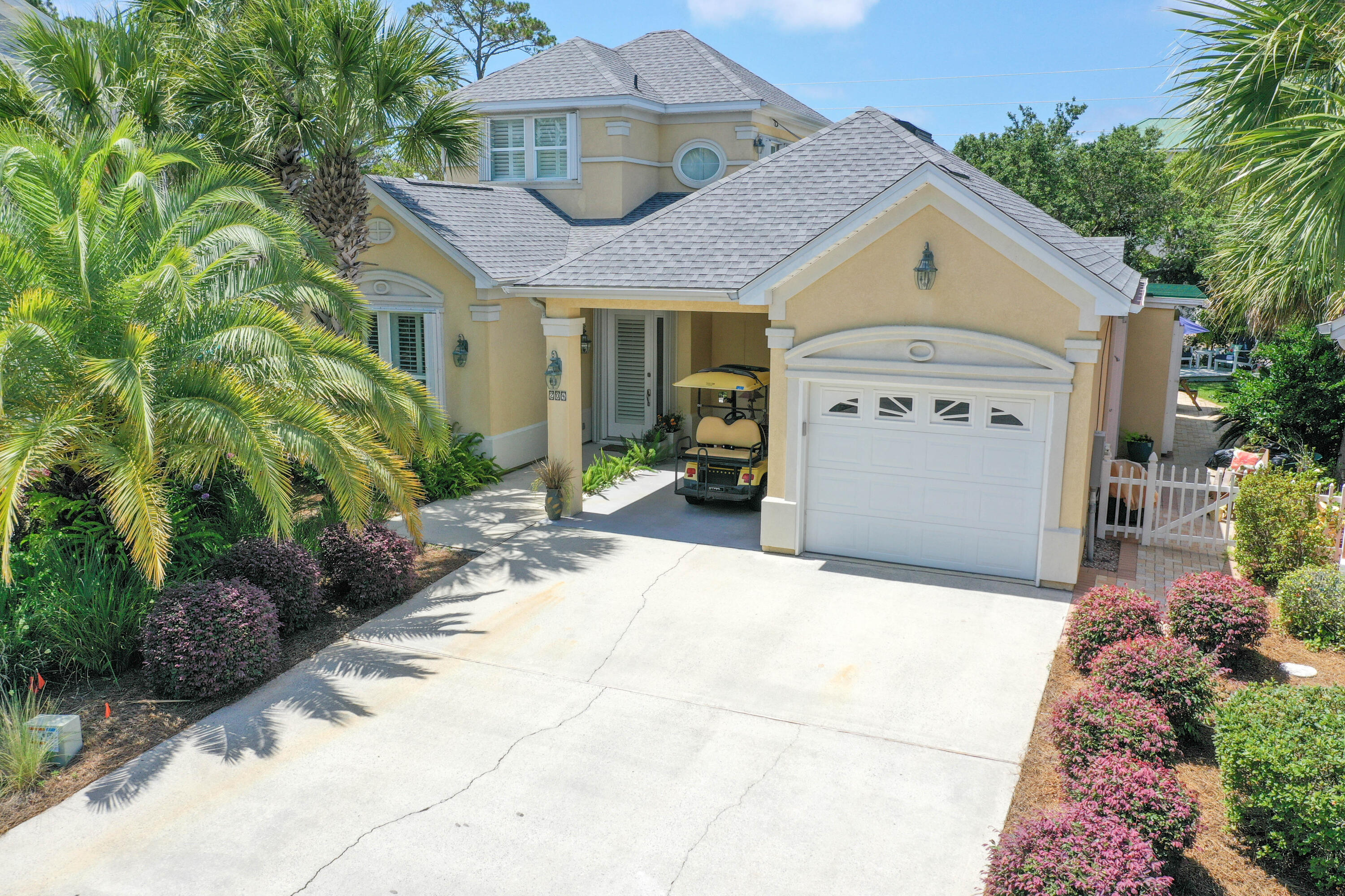 A fabulous floor plan in a convenient location and short distance to the beach. Fairway Villas is a quiet community featuring quality construction, a community pool and sits along the third fairway of the SRB Golf Club. Open floor plan. Heated and cooled sunroom serves as dining area or family room. Master suite on main floor with walk-in closet. First floor guest bedroom can be used as an office or studio. Bedroom on second floor has a full bath and French doors leading out to the deck where you can enjoy the cool breezes and setting sun. Custom cabinets in kitchen & baths. High end lighting throughout. Plantation shutters. Hurricane shutters. Screened-in back porch. HOA dues include front yard maintenance. Being sold unfurnished but some furnishings are negotiable. NO SHORT TERM RENTALS.