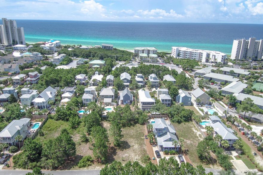 Location without the crowds! Great homesite opportunity in Seagrove's Village of Sugar Beach. Walk to restaurants and shopping. Short stroll to the Gulf of Mexico and an easy bike ride to Seaside and WaterColor. Deeded beach access. Swimming pool amenity across the street. There is no build out timeframe associated with this homesite. Ideal spot for your vacation home!