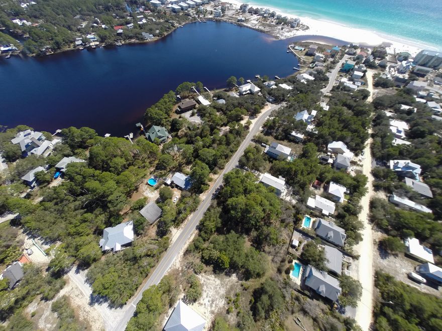 If you have ever dreamed of owning a piece of paradise at the beach, now is your chance to purchase this lovely lot, build your own beach house, walk down the street to the beach and enjoy this laid back atmosphere. Lot is south of Scenic 30A and within a few steps you can be on your paddle board or in a kayak on the Eastern Lake or in the Gulf.If you built up at least three stories, you may have a good view of the Eastern Lake and the Gulf.The adjoining Lot is also available for purchase.
