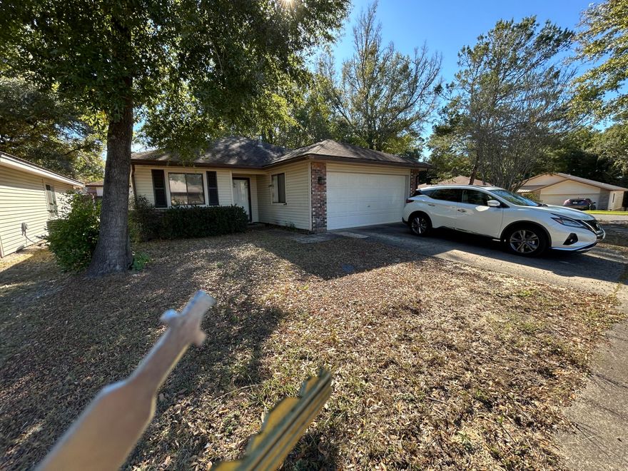 This home has been renovated with vinyl wood plank floors throughout for easy maintenance, some new light fixtures and updated kitchen.  Corner lot conveniently located.  This home is a split floor plan with cathedral ceiling.  Home has 2 Car garage. Home is within walking distance to college, middle school, park, library, high school, restaurants and sports complex making this the perfect rental .   Owner is a licensed Real estate agent. No Dogs. No animals.  Text Marsha Thomas-Curry at 850-240-2861