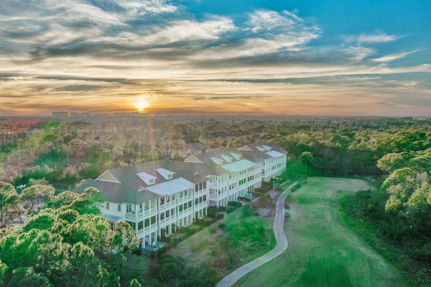 Perfection with spectacular bay views throughout!  This gorgeous end unit, three story town home overlooking the 3rd hole of Kelly Plantation's Golf Course is built to perfection.  Unlike the other Brownstones this one offers unobstructed spectacular bay views, an easement to the side has a wooded area to maintain privacy and this Brownstone boasts the largest square footage.  The kitchen is an entertainer's dream with a Wolf stove, Sub Zero appliances, coffee bar, oversized island and conversational area.  The home features an elevator and large two car garage for everyday convenience. The master suite offers beautiful views, a large walk in closet and master bathroom suite with a coffee bar built for relaxation in mind.  The home has high end fixtures and custom barn wood porcelain tile