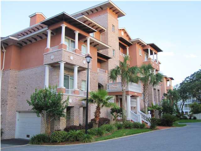 This is a terrific second floor condominium in Villa Di Mare.; A waterfront complex. Architecture is of Italian Mediterranean design. This spacious condominium has three bedrooms and two and one half baths with awesome views of the Bay. Villa di Mare features five buildings and five condos per building; also has a pool and is a non-short term rental complex; a minimum of a one-year lease is required. Each building has an elevator, two staircases, a fire suppressant system, 9' ceilings, and crown molding. Each home owner gets their own garage and separate storage unit on the first floor. A wonderful project for owner occupants! Plans are underway to improve parking and landscaping.