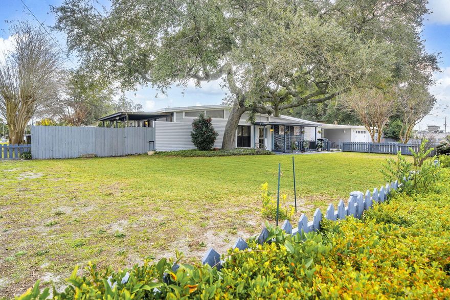 MULTI-GENERATIONAL HOME - POOL HOME located in Fort Walton Beach, FL. Endless possibilities with this large 3 bedroom home with a mother in law suite and 2 lock out opportunities. This property would be perfect for a large family or someone looking for 3 mother-in-law suites. You will love the communal backyard that shares a large pool and outdoor space that can host considerable sized gatherings. This home is made for entertainment as there is plenty of space for everyone. The main home offers a sunken living room, a formal dining and informal dining space that overlooks the living room. The kitchen is open to an informal dining space and is equipped with a gas range. Just off the kitchen you will find a generous sized laundry room (indoor) a bathroom and a good-sized suite.
The covered side porch off the main home is the perfect place for some privacy. The porch is just off the formal dining room which makes easy access to the kitchen and living room; It's the perfect spot for your morning coffee or afternoon cocktails.
Studio #1 is connected to the main home but could be a lock out if needed. It conveys as seen with a queen bed, a full bath, and a small dining area. This mini suite has its own private entrance and has access to the communal backyard and pool.
Studio #3 is true lockout complete with a queen bed and a kitchenette.
The communal backyard is the heart of the property featuring a BRAND NEW POOL LINER in the large pool, grilling area, outdoor dining, poolside bar- what a great place to impress your guests!
The current owner has security cameras set up as an extra layer of peace of mind.