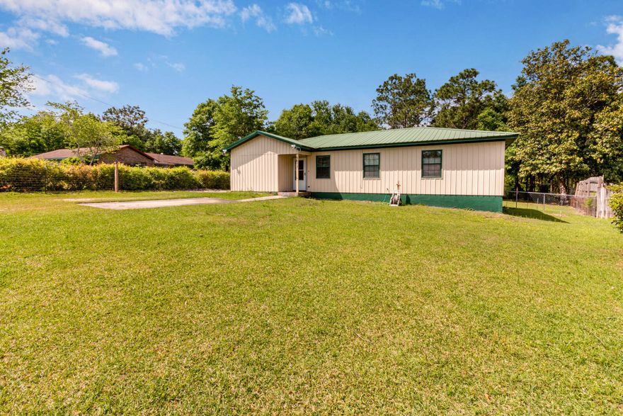 Very well maintained home on nearly 1/2 acre! Refinished kitchen cabinets, and newer appliances are in place with slate tile throughout the home. A new shed was built in recent years, as well as  new windows in the home. Less than 3 miles from the cinema, grocery stores, and the park!Buyer to verify all dimensions and measurements.