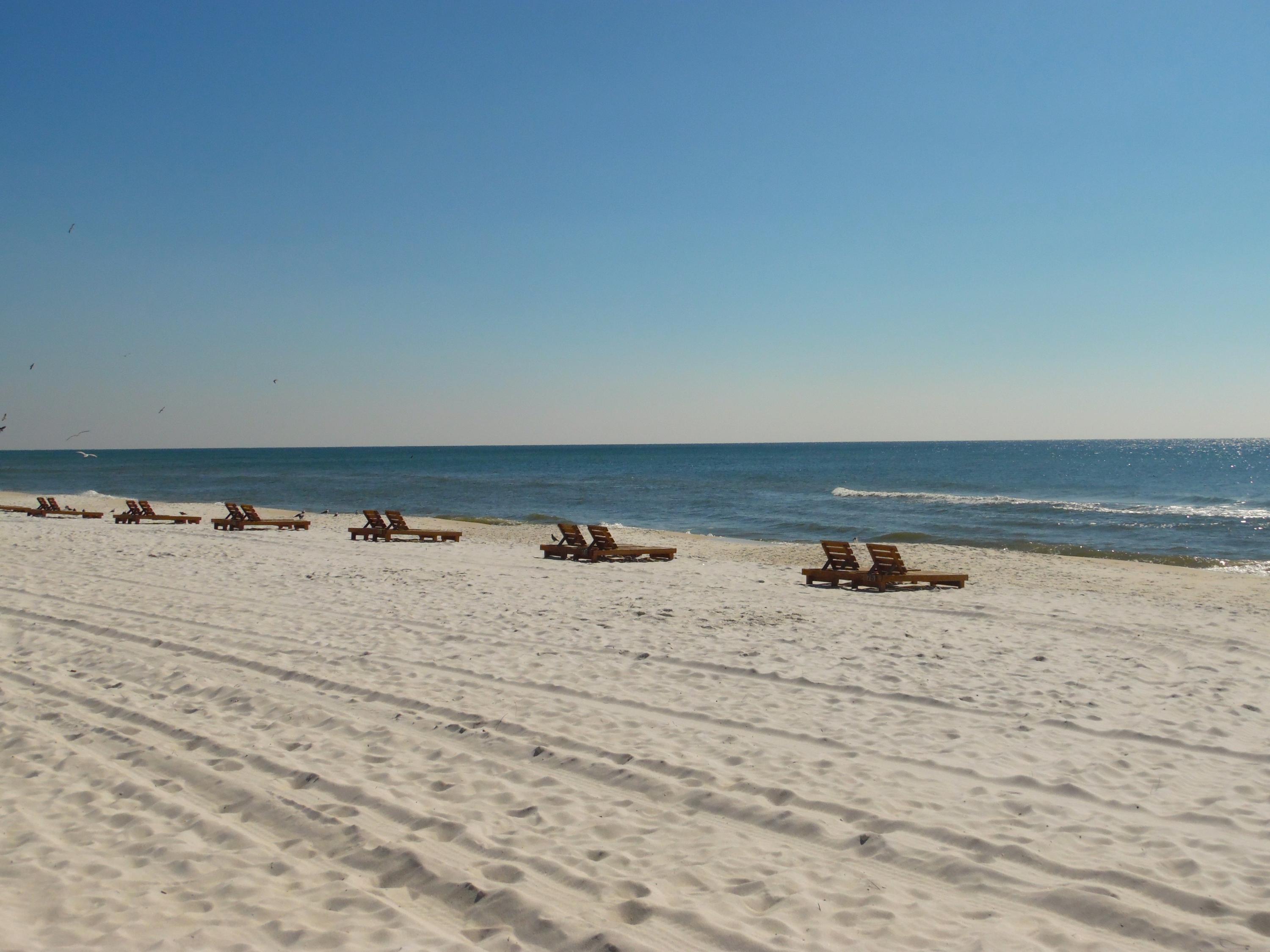 Wow! A spacious, west-end corner unit! Better yet; This unit is located on the peaceful west-end of the beach at Celadon Condominiums. There is plenty of room for the entire family. This split bedroom plan has a Gulf front master with magnificent views. The open living/kitchen floor plan is wrapped with a balcony large enough to accommodate the whole gang for those evening sunsets. The western skyline is a site to see also! Celadon is one of the few high rises on the west-end of the beach actually the one so the view of the skyline is remarkable! Celadon offers just the right amount of amenities. They include 2 pools one is heated for those cooler months, 2 hot tubs, a fitness center and a tennis court. There is plenty of parking with the 4 level parking garage ( with Elevator)