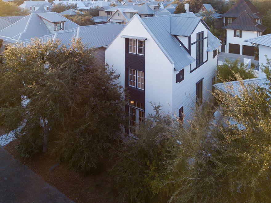 This exceptionally maintained 4 bedroom/3.5 bath home, located in the heart of Rosemary Beach, is the perfect place to relax with family and friends. On the first floor you will enjoy an open concept kitchen/diving/living area featuring a recently renovated kitchen with a gas range, stainless steel appliances, quartzite countertops, glass tile backsplash, and a half bath, all tastefully decorated with a sleek, coastal decor.The spacious master bedroom is one of two bedrooms located on the second floor, and features a master bath, walk in closet and two balconies - one overlooking the private heated pool and the other shared with the additional second floor bedroom.The third level features the third and fourth bedrooms, one of which is dedicated to a bunk room and a full bathroom.
