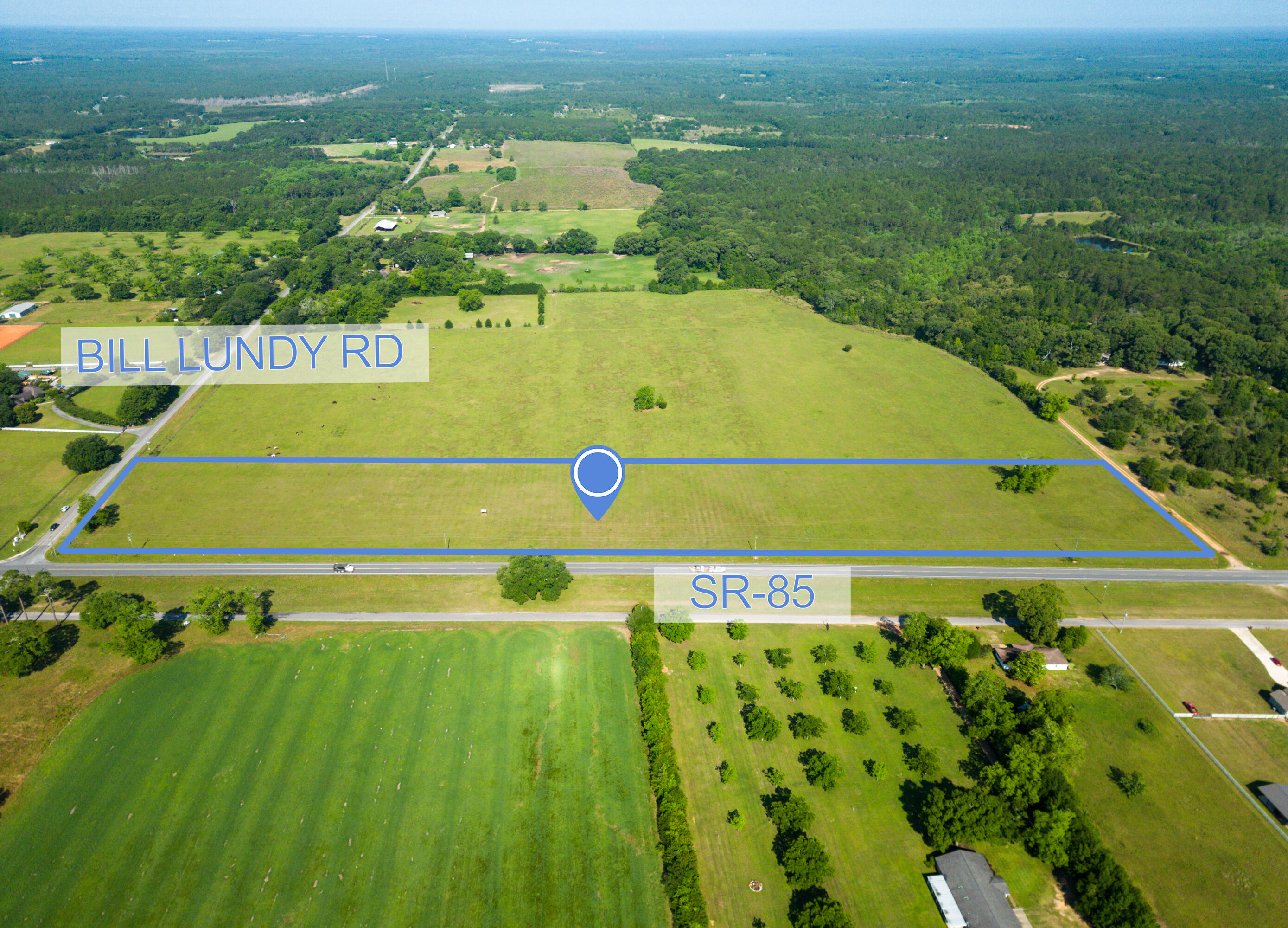 What an ideal location for a gas station/retail shops or both! Beautiful 12.75 acres of cleared commercial property with 1700' of road frontage along Hwy 85. Zoned C-3. Ten miles to the nearest gas station to the north in Laurel Hill and five miles to the south in Crestview. Large 200 housing development within two miles to the north and over 100 to the west . With several others nearby. Survey is available.
